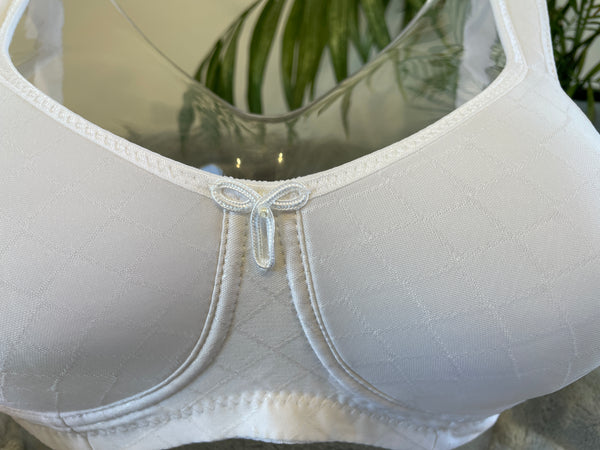 Close up picture of our wire-free mastectomy bra, Julie. Julie is a white bra designed for comfort and support.