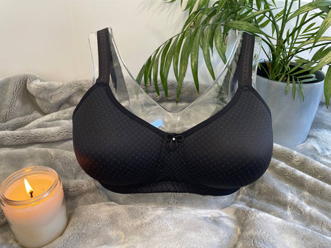 Anna Pocketed Wire-Free Mastectomy Bra in black with a stylish print, featuring smooth moulded cups, adjustable straps, and side support. 