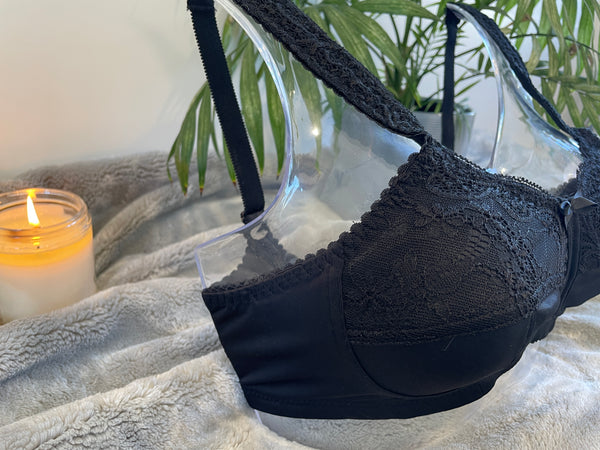 Side on picture of our wire-free mastectomy bra, Flora. Flora is a black bra designed for comfort and support.