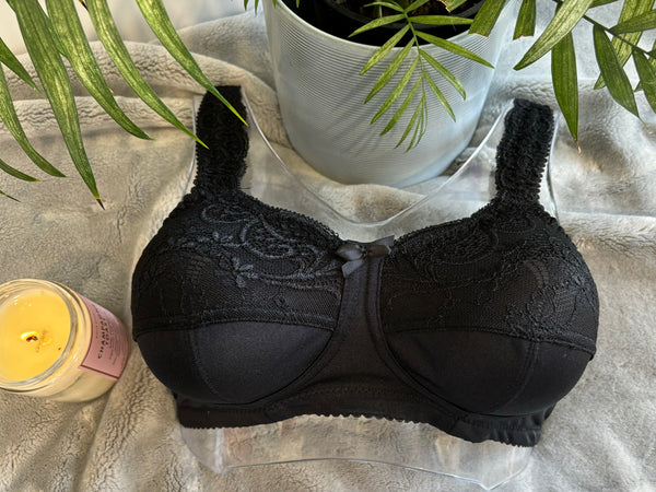 Front on picture of our wire-free mastectomy bra, Lola. Lola is a black bra designed for comfort and support.